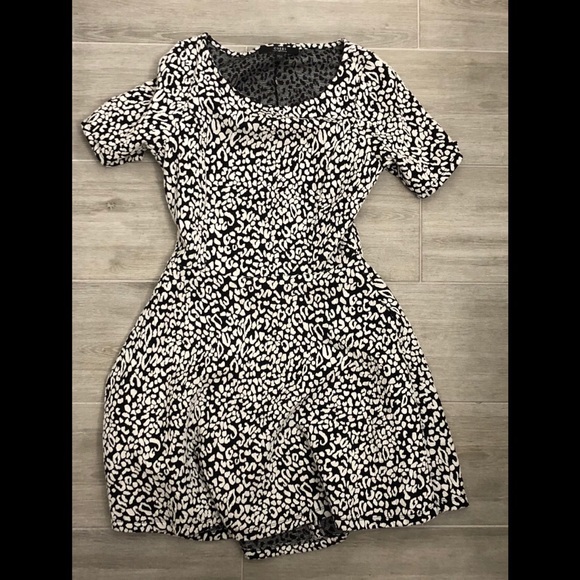 Guess Dresses & Skirts - Guess Snow Leopard Pattern Cutout Skater Dress